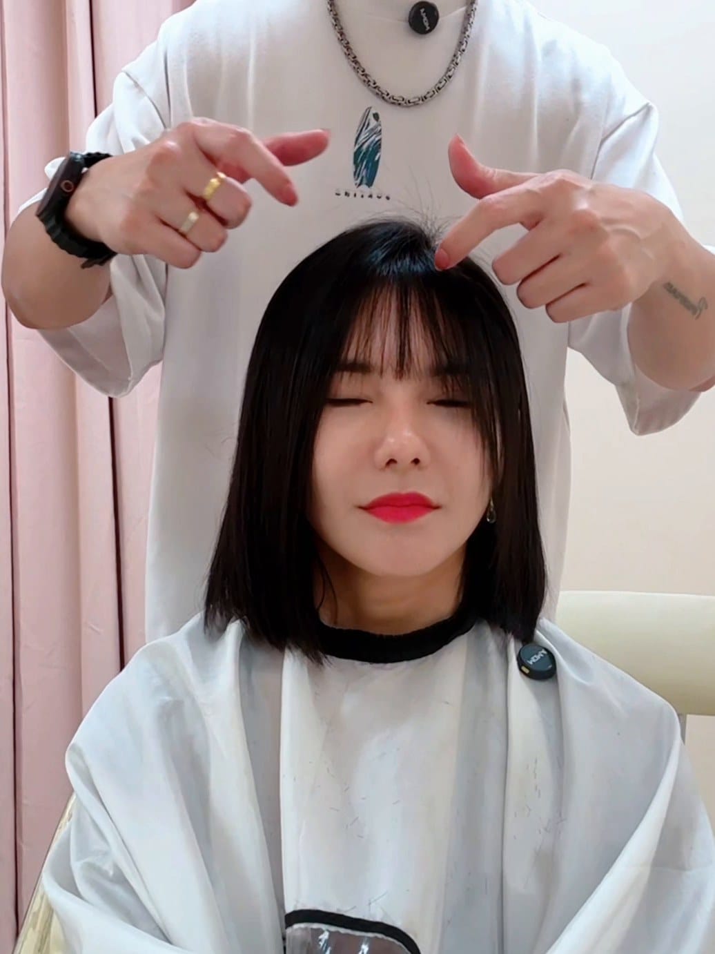 Women's haircut from long hair to bob at Minus Over Hair Studio, after