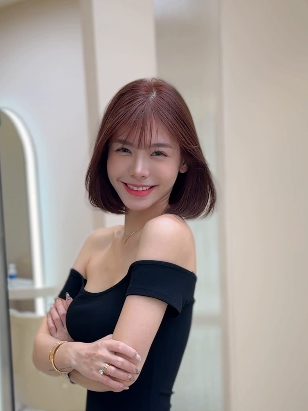 Women's bob haircut with rose brown colour at Minus Over Hair Studio, after