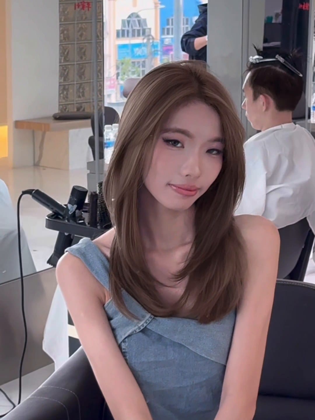Women's layered haircut at Minus Over Hair Studio, after